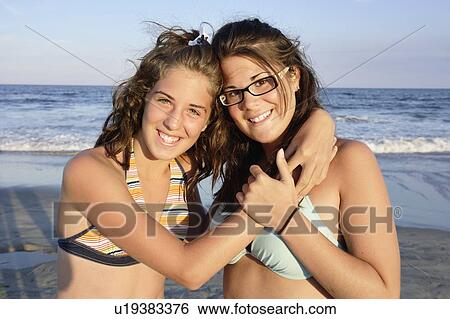 View of teenager (12 and 16 years old) on beach at sunset, New Jersy, USA View Large Photo Image Stock Photograph - View of teenager (12 and 16 years old) on beach at sunset, New Jersy, USA. Fotosearch