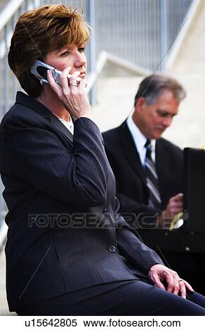 Businesswoman on cell phone View Large Photo Image Stock Photography - Businesswoman on cell phone. Fotosearch