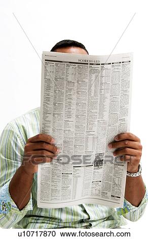Stock Image - Man reading newspaper. Fotosearch