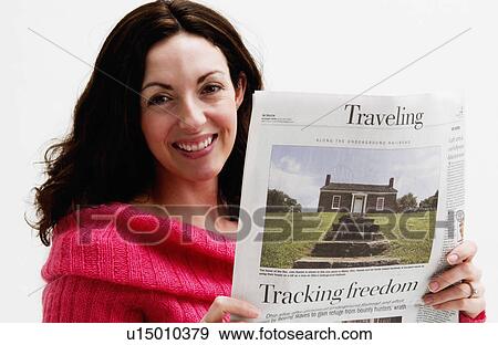 Woman reading newspaper View Large Photo Image Stock Photo - Woman reading newspaper. Fotosearch