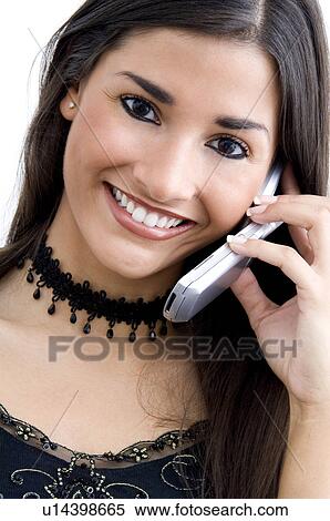 Stock Photography - Woman talking on cell phone. Fotosearch