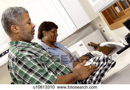 African American senior couple washing dishes View Large Photo Image Stock Image - African American senior couple washing dishes. Fotosearch