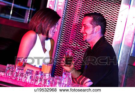 Couple at a nightclub View Large Photo Image Stock Photo - Couple at a nightclub. Fotosearch