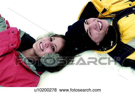 Stock Photo - Couple in snow. Fotosearch