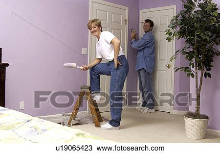 Stock Image - Couple painting. Fotosearch