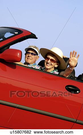 Senior couple in convertible View Large Photo Image Stock Image - Senior couple in convertible. Fotosearch