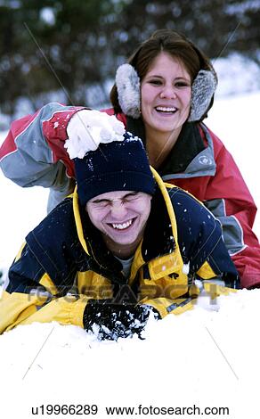 Stock Photo - Couple in snow. Fotosearch