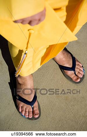 Graduate wearing flip flops View Large Photo Image Stock Photograph - Graduate wearing flip flops. Fotosearch