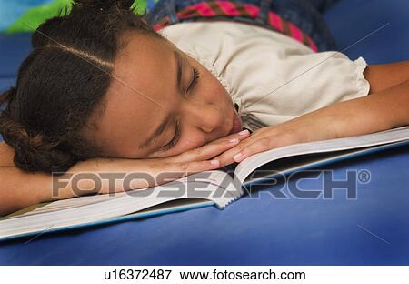 African American girl falling asleep doing homework View Large Photo Image Stock Photo - African American girl falling asleep doing homework. Fotosearch