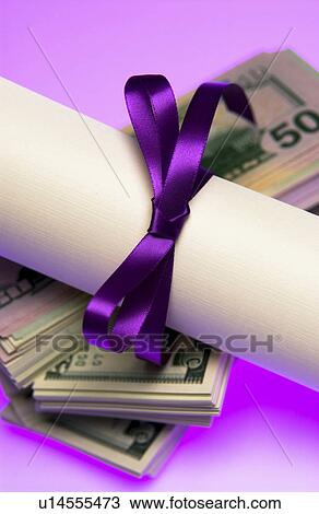 Stock Image - Diploma with money. Fotosearch