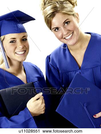 Girls in cap and gown for graduation View Large Photo Image Stock Image - Girls in cap and gown for graduation. Fotosearch