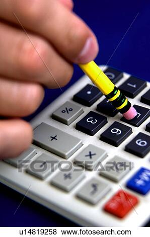 Man using calculator View Large Photo Image Stock Photo - Man using calculator. Fotosearch
