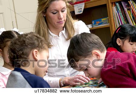 Teacher with class View Large Photo Image Stock Image - Teacher with class. Fotosearch