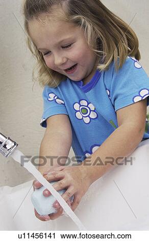 Girl washing hands View Large Photo Image Stock Image - Girl washing hands. Fotosearch