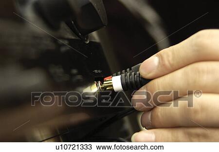 Man fixing stereo View Large Photo Image Stock Image - Man fixing stereo. Fotosearch