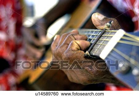 Man playing guitar View Large Photo Image Stock Image - Man playing guitar. Fotosearch