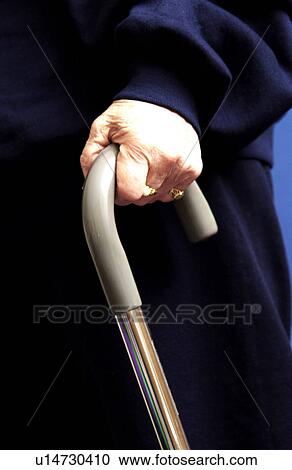 Womans hands on cane View Large Photo Image Stock Image - Womans hands on cane. Fotosearch