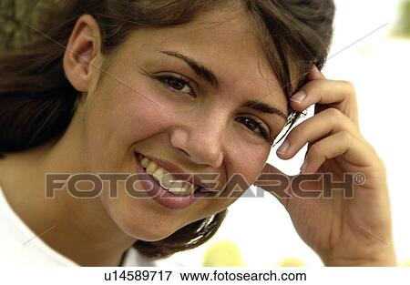 Close up of woman smiling View Large Photo Image Stock Photo - Close up of woman smiling. Fotosearch