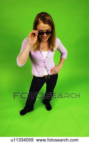 Teen girl wearing sunglasses Teen girl wearing sunglasses Teen g View Large Photo Image Stock Photo - Teen girl wearing sunglasses Teen girl wearing sunglasses Teen g. Fotosearch