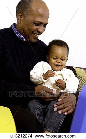 Picture - African American Grandpa with grandson. Fotosearch