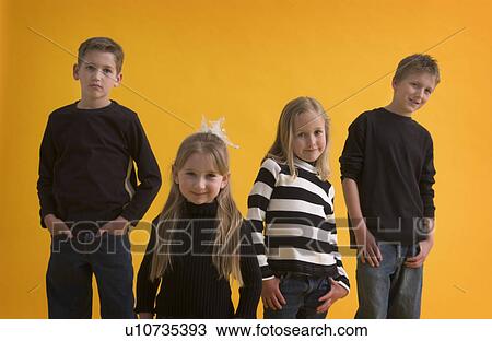 Stock Image - Boys and girls posing. Fotosearch