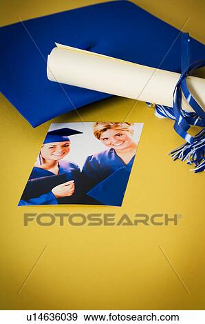 Stock Photo - Graduation photo diploma cap and tassel. Fotosearch