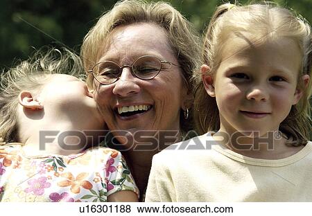 Stock Photo - Grandma with grandchildren. Fotosearch