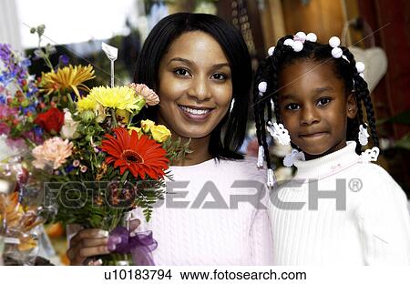 Mother and daughter at florist View Large Photo Image Picture - Mother and daughter at florist. Fotosearch