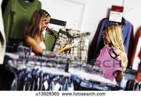 Stock Photography - Two women shopping. Fotosearch