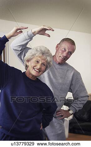 Senior couple exercising View Large Photo Image Stock Photo - Senior couple exercising. Fotosearch