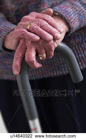 Senior womans hands on cane View Large Photo Image Stock Image - Senior womans hands on cane. Fotosearch