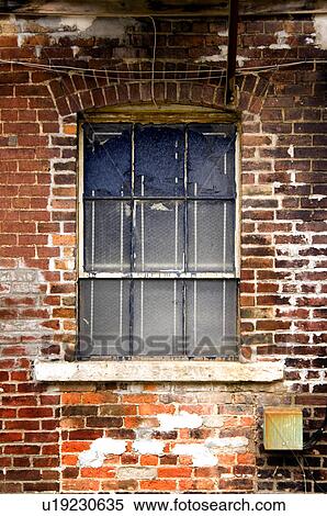 Stock Photography - Exterior window on brick building. Fotosearch