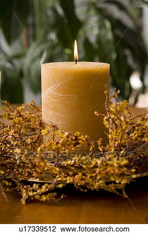 Stock Image - Fall decorative candle. Fotosearch