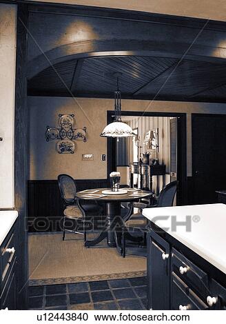 Stock Image - Kitchen and dining room. Fotosearch