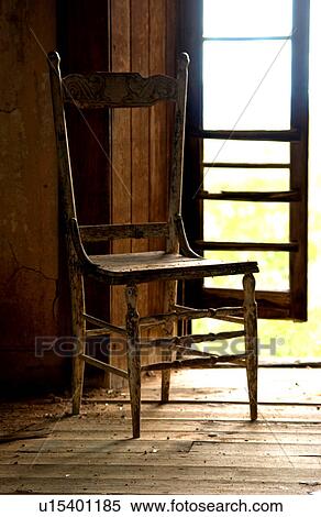Stock Photography - Old chair in abandoned house. Fotosearch