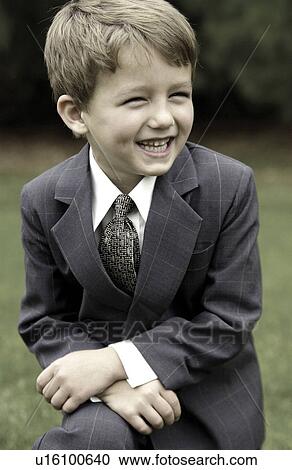 Boy in suit and tie View Large Photo Image Stock Image - Boy in suit and tie. Fotosearch