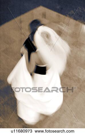 Bride and groom dancing View Large Photo Image Stock Image - Bride and groom dancing. Fotosearch