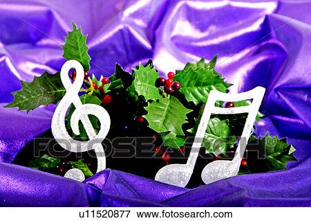 Stock Photo - Holly with musical note ornaments. Fotosearch