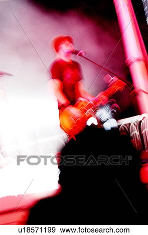 Man playing guitar and singing View Large Photo Image Stock Photo - Man playing guitar and singing. Fotosearch