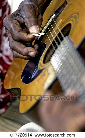 Man playing guitar View Large Photo Image Picture - Man playing guitar. Fotosearch