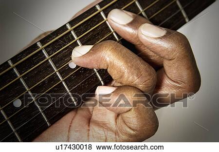 Man playing guitar View Large Photo Image Stock Photo - Man playing guitar. Fotosearch