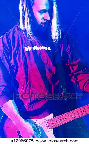 Man playing guitar View Large Photo Image Stock Photography - Man playing guitar. Fotosearch