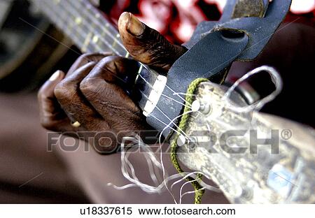 Stock Photography - Man playing guitar. Fotosearch