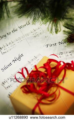 Package with Christmas sheet music View Large Photo Image Stock Image - Package with Christmas sheet music. Fotosearch