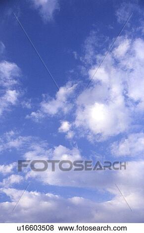 Blue sky with clouds View Large Photo Image Stock Photo - Blue sky with clouds. Fotosearch