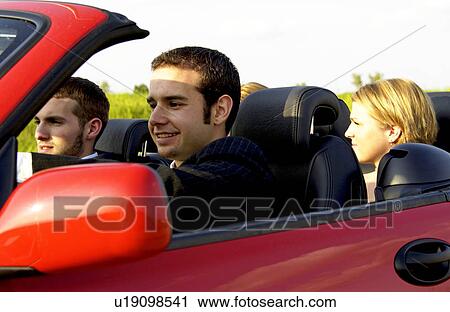 3 people in red convertible View Large Photo Image Stock Image - 3 people in red convertible. Fotosearch