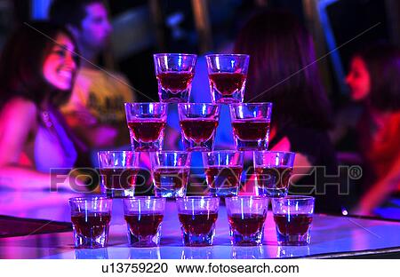 Young adults at a nightclub View Large Photo Image Stock Image - Young adults at a nightclub. Fotosearch