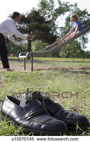 Stock Photography - Father and daughter at playground. Fotosearch