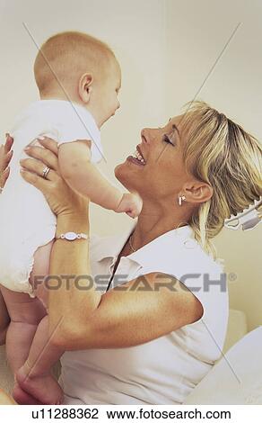 Mother and baby View Large Photo Image Stock Image - Mother and baby. Fotosearch