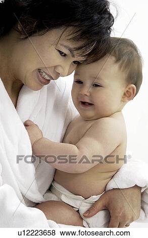 Stock Photo - Mother and baby. Fotosearch